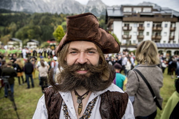 LEOGANG, AUSTRIA - OCTOBER 3: A contestant of the World Beard And Mustache Championships poses for a picture during the opening ceremony of the Championchips 2015 on October 3, 2015 in Leogang, Austria. Over 300 contestants in teams from across the globe have come to compete in sixteen different categories in three groups: mustache, partial beard and full beard. The event takes place every few years at different locations worldwide. (Photo by Jan Hetfleisch/Getty Images)