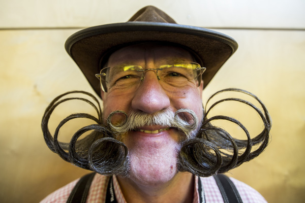 LEOGANG, AUSTRIA - OCTOBER 3:  A contestant of the World Beard And Mustache Championships poses for a picture during the Championships 2015 on October 3, 2015 in Leogang, Austria. Over 300 contestants in teams from across the globe have come to compete in sixteen different categories in three groups: mustache, partial beard and full beard. The event takes place every few years at different locations worldwide. (Photo by Jan Hetfleisch/Getty Images)