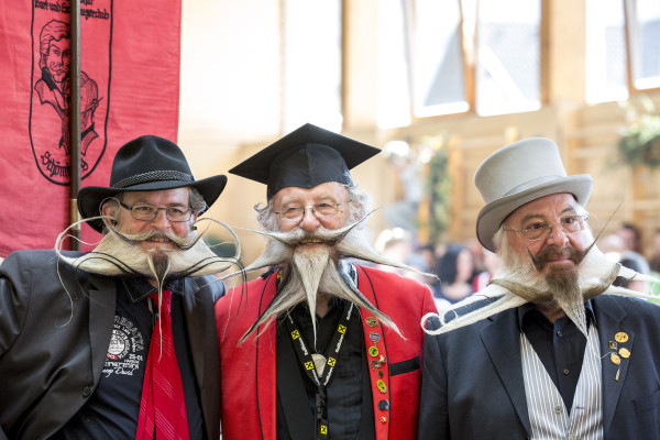 LEOGANG, AUSTRIA - OCTOBER 3:  Contestants of the World Beard And Mustache Championships pose for a picture during the Championships 2015 on October 3, 2015 in Leogang, Austria. Over 300 contestants in teams from across the globe have come to compete in sixteen different categories in three groups: mustache, partial beard and full beard. The event takes place every few years at different locations worldwide. (Photo by Jan Hetfleisch/Getty Images)