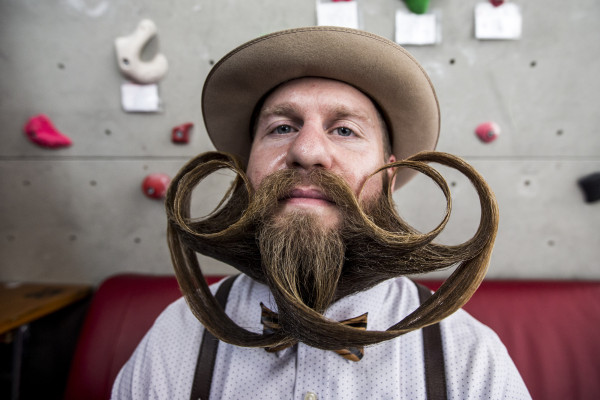 LEOGANG, AUSTRIA - OCTOBER 3:  A contestant of the World Beard And Mustache Championships poses for a picture during the Championships 2015 on October 3, 2015 in Leogang, Austria. Over 300 contestants in teams from across the globe have come to compete in sixteen different categories in three groups: mustache, partial beard and full beard. The event takes place every few years at different locations worldwide. (Photo by Jan Hetfleisch/Getty Images)