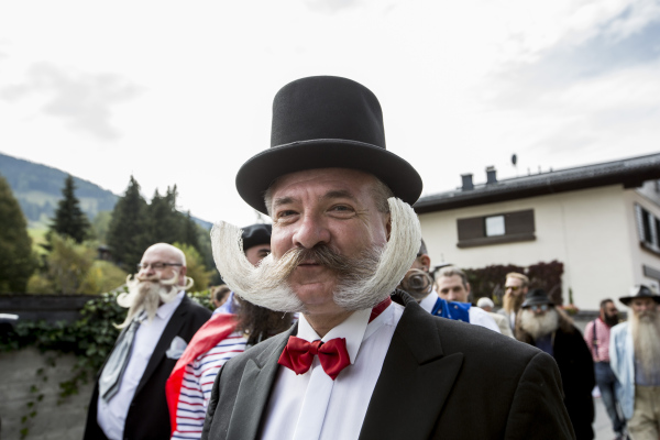 LEOGANG, AUSTRIA - OCTOBER 3:  A contestant of the World Beard And Mustache Championships poses for a picture during the opening ceremony of the Championships 2015 on October 3, 2015 in Leogang, Austria. Over 300 contestants in teams from across the globe have come to compete in sixteen different categories in three groups: mustache, partial beard and full beard. The event takes place every few years at different locations worldwide. (Photo by Jan Hetfleisch/Getty Images)